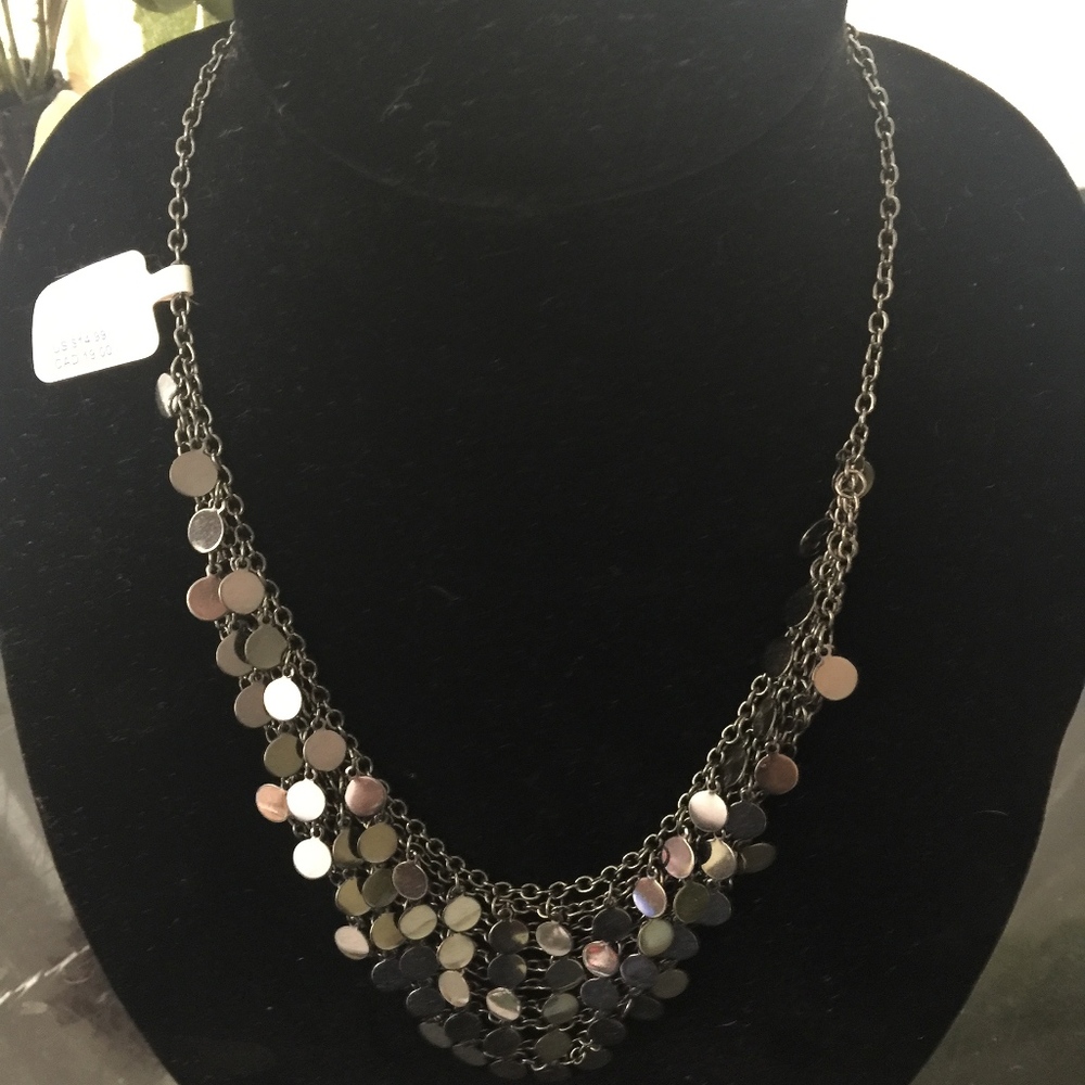 Silver sequin costume necklace.